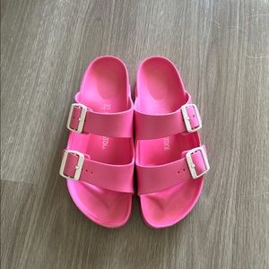 Bright pink Arizona essential Birkenstock’s